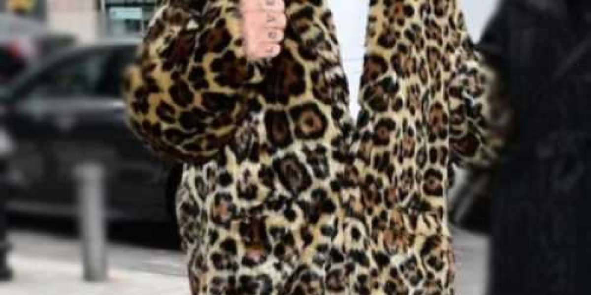 The Icon of Rock Royalty: The Robbie Williams Leopard Print Fur Coat